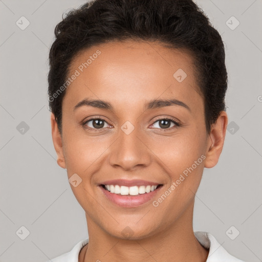 Joyful white young-adult female with short  brown hair and brown eyes