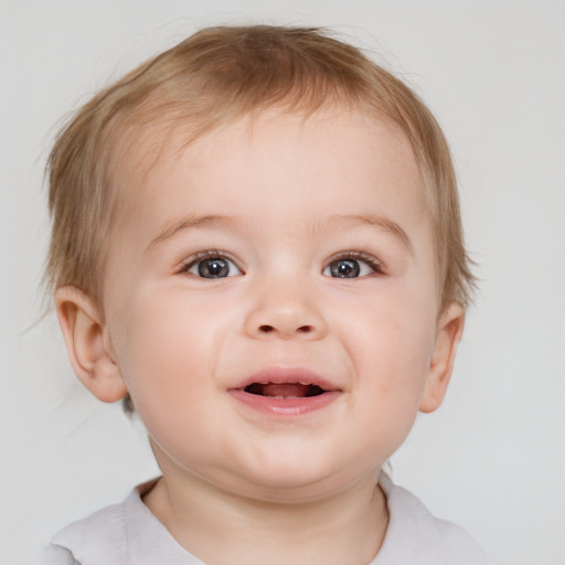 Joyful white child male with short  brown hair and brown eyes