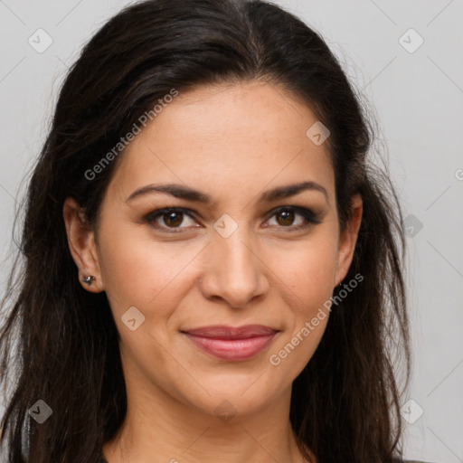 Joyful latino young-adult female with long  brown hair and brown eyes