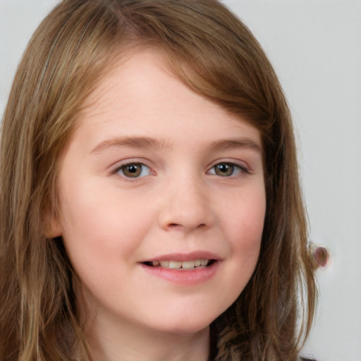 Joyful white child female with long  brown hair and brown eyes