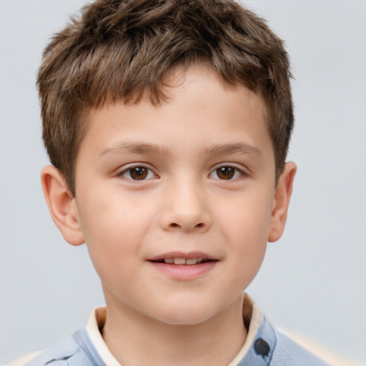 Joyful white child male with short  brown hair and brown eyes