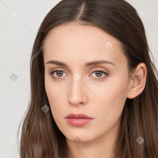 Neutral white young-adult female with long  brown hair and brown eyes