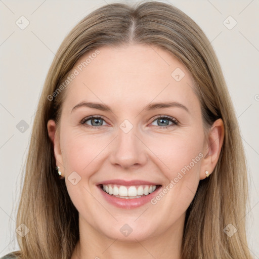 Joyful white young-adult female with long  brown hair and grey eyes