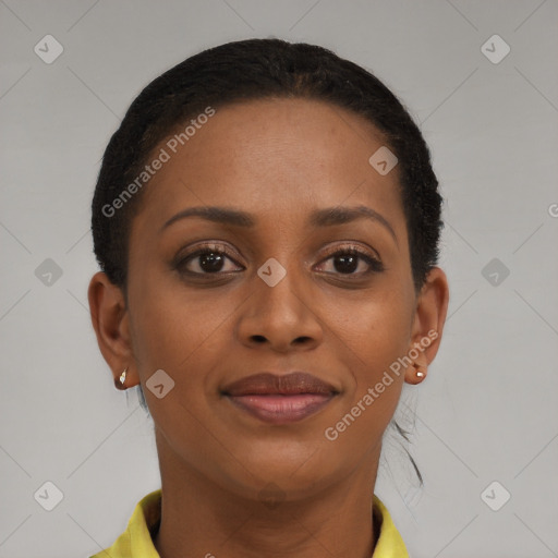 Joyful black young-adult female with short  brown hair and brown eyes