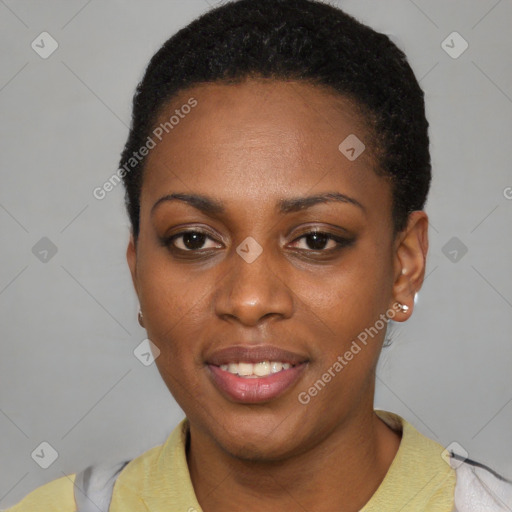 Joyful black young-adult female with short  black hair and brown eyes