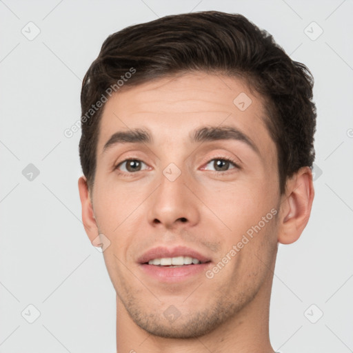 Joyful white young-adult male with short  brown hair and brown eyes