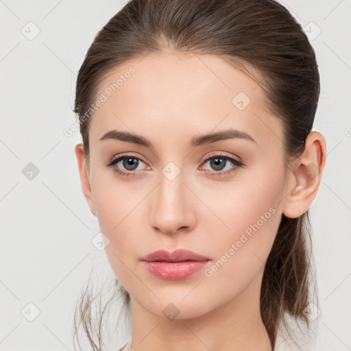 Neutral white young-adult female with medium  brown hair and brown eyes