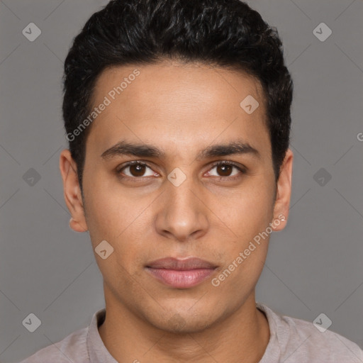 Joyful latino young-adult male with short  brown hair and brown eyes