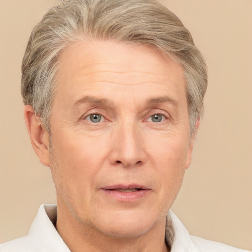 Neutral white middle-aged male with short  blond hair and grey eyes