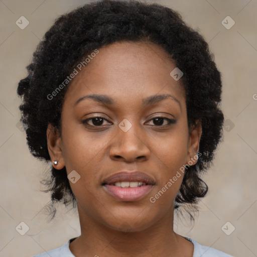 Joyful black young-adult female with medium  black hair and brown eyes