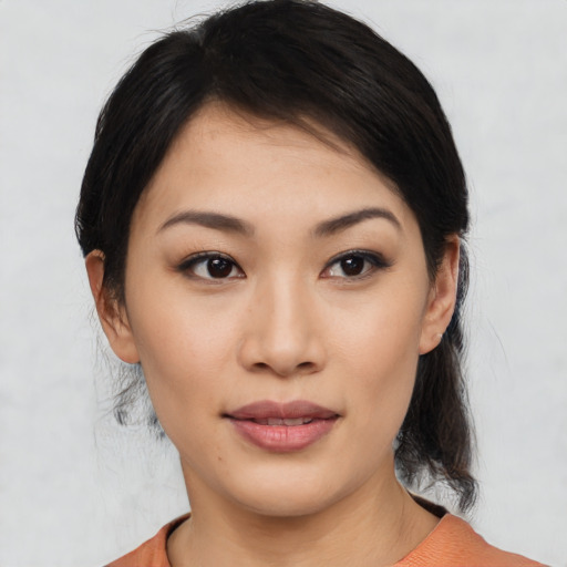 Neutral asian young-adult female with medium  black hair and brown eyes