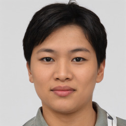 Joyful asian young-adult female with short  black hair and brown eyes