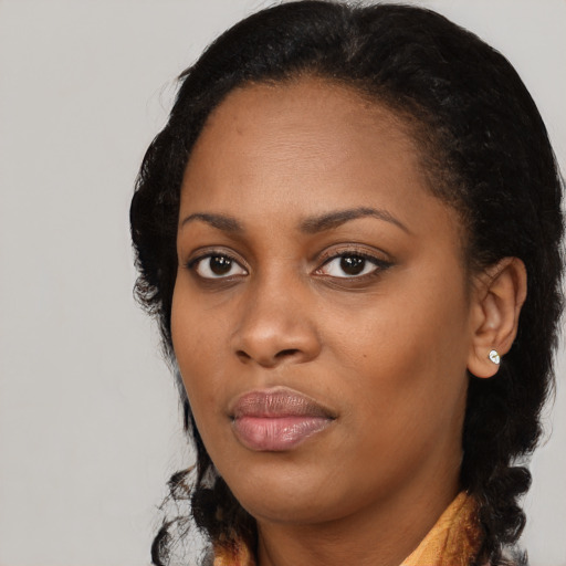Neutral black young-adult female with long  black hair and brown eyes