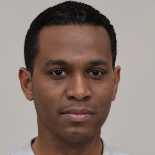 Neutral black young-adult male with short  black hair and brown eyes