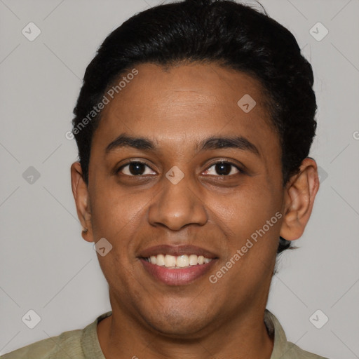 Joyful black young-adult male with short  black hair and brown eyes