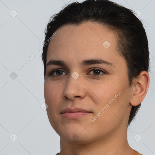 Joyful white young-adult female with short  brown hair and brown eyes