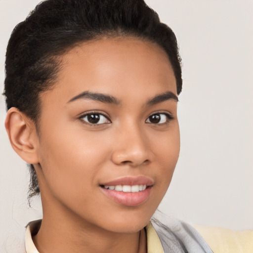 Joyful latino young-adult female with short  brown hair and brown eyes