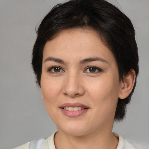 Joyful white young-adult female with medium  brown hair and brown eyes