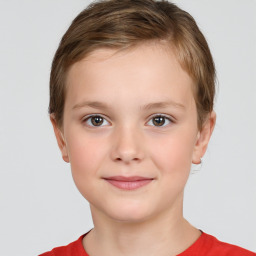 Joyful white child female with short  brown hair and brown eyes