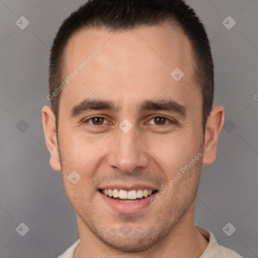 Joyful white young-adult male with short  brown hair and brown eyes