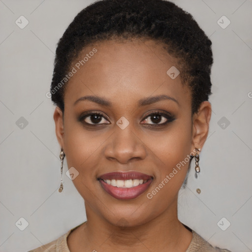 Joyful black young-adult female with short  brown hair and brown eyes