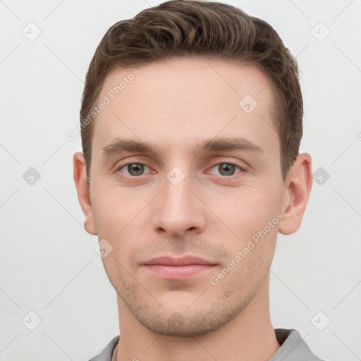 Neutral white young-adult male with short  brown hair and grey eyes