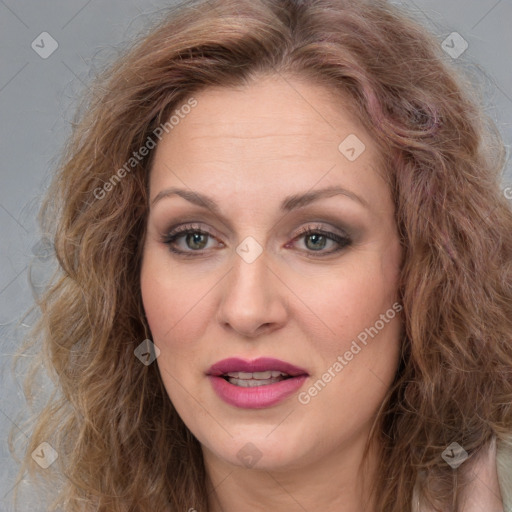 Joyful white young-adult female with long  brown hair and blue eyes