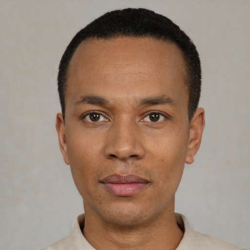Neutral black young-adult male with short  black hair and brown eyes
