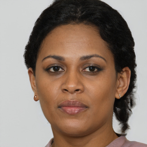 Neutral latino adult female with short  brown hair and brown eyes