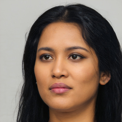 Neutral latino young-adult female with long  black hair and brown eyes