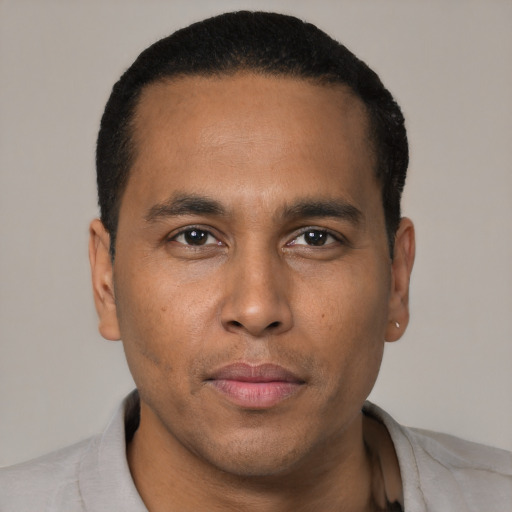 Neutral black young-adult male with short  brown hair and brown eyes