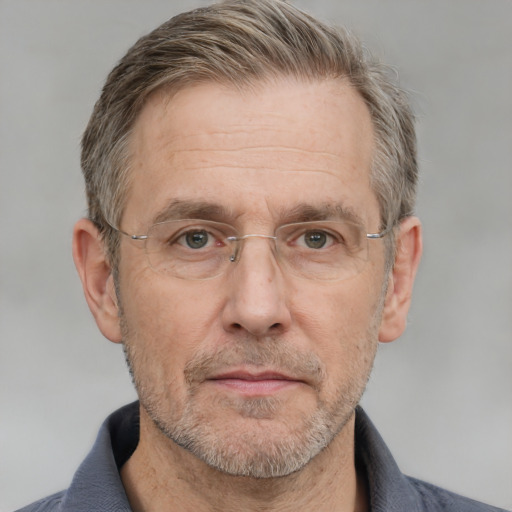 Neutral white middle-aged male with short  brown hair and grey eyes