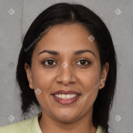 Joyful latino young-adult female with medium  brown hair and brown eyes