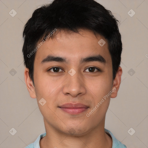 Joyful asian young-adult male with short  black hair and brown eyes