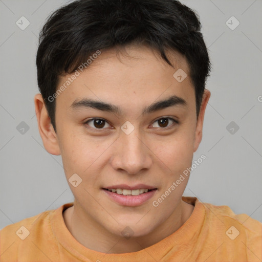 Joyful asian young-adult male with short  brown hair and brown eyes