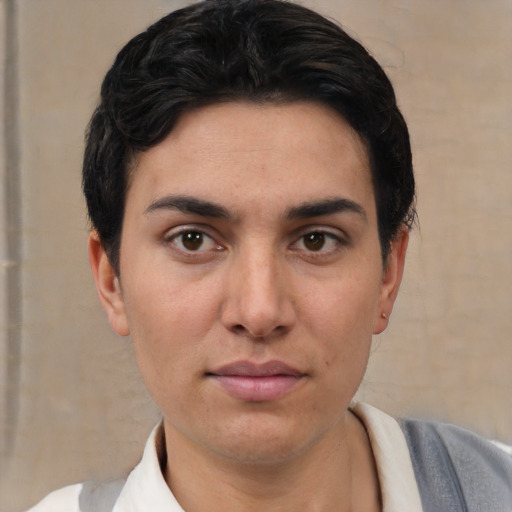 Neutral white young-adult female with short  black hair and brown eyes