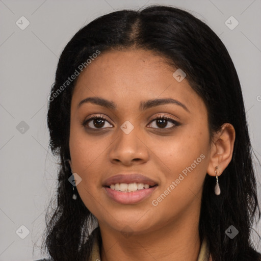 Joyful latino young-adult female with long  black hair and brown eyes