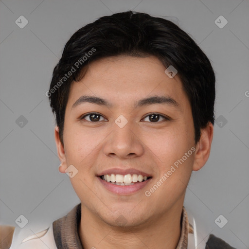 Joyful asian young-adult male with short  brown hair and brown eyes