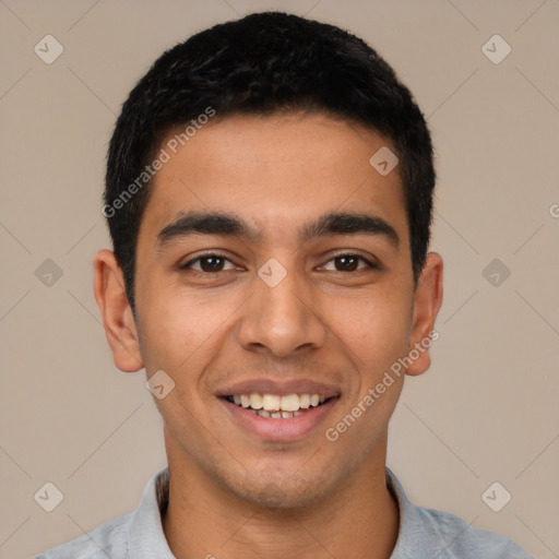 Joyful latino young-adult male with short  black hair and brown eyes