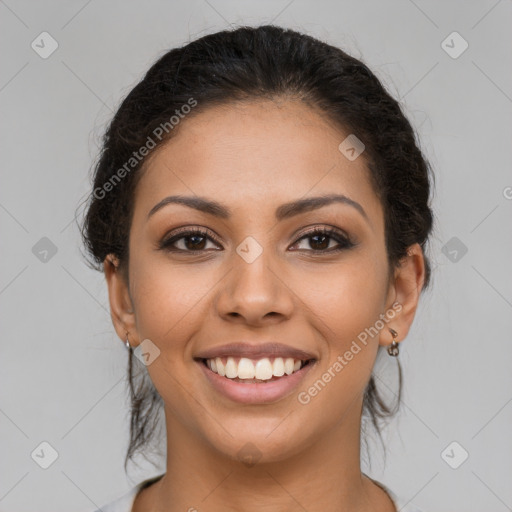 Joyful latino young-adult female with long  brown hair and brown eyes