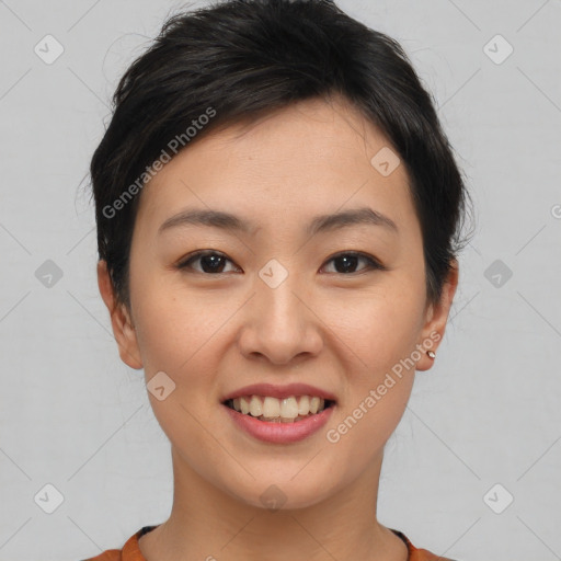 Joyful asian young-adult female with short  brown hair and brown eyes