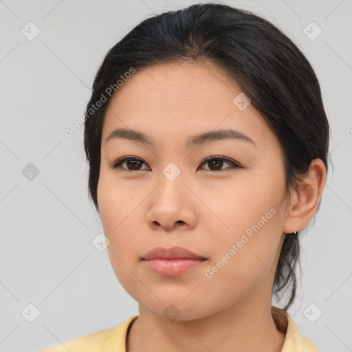 Neutral asian young-adult female with medium  brown hair and brown eyes