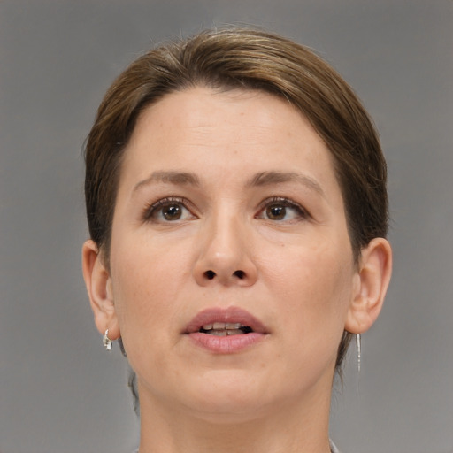 Neutral white adult female with short  brown hair and brown eyes