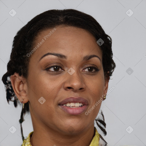 Joyful black adult female with short  brown hair and brown eyes