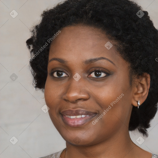 Joyful black young-adult female with medium  black hair and brown eyes