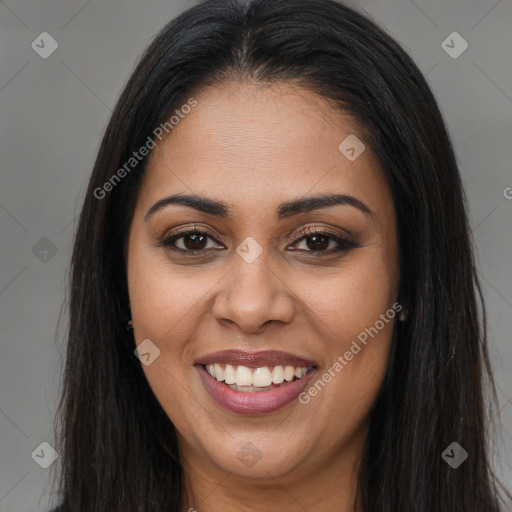 Joyful latino young-adult female with long  brown hair and brown eyes