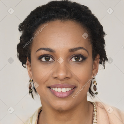 Joyful black young-adult female with long  black hair and brown eyes