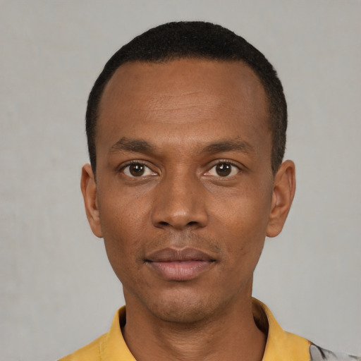 Neutral black young-adult male with short  black hair and brown eyes