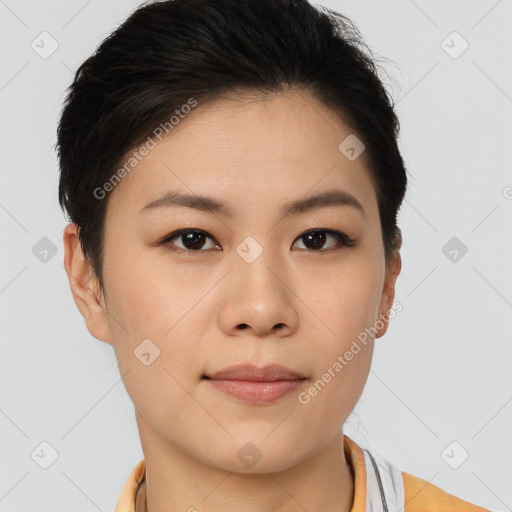 Joyful asian young-adult female with short  brown hair and brown eyes