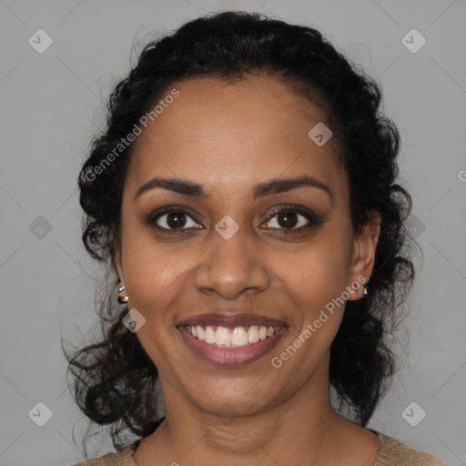 Joyful black young-adult female with medium  black hair and brown eyes